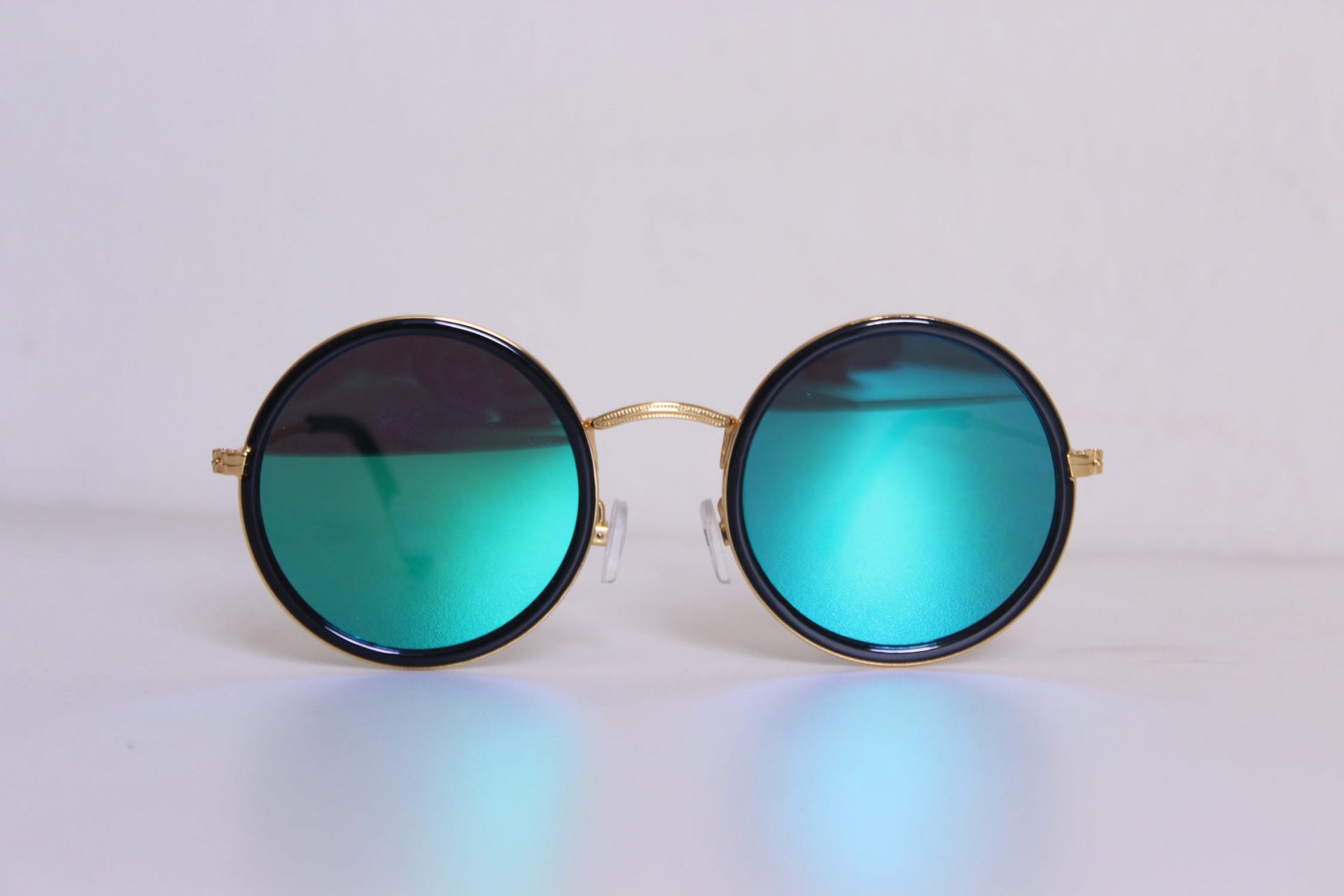 5 Reasons to Invest in Designer Sunglasses EZOnTheEyes