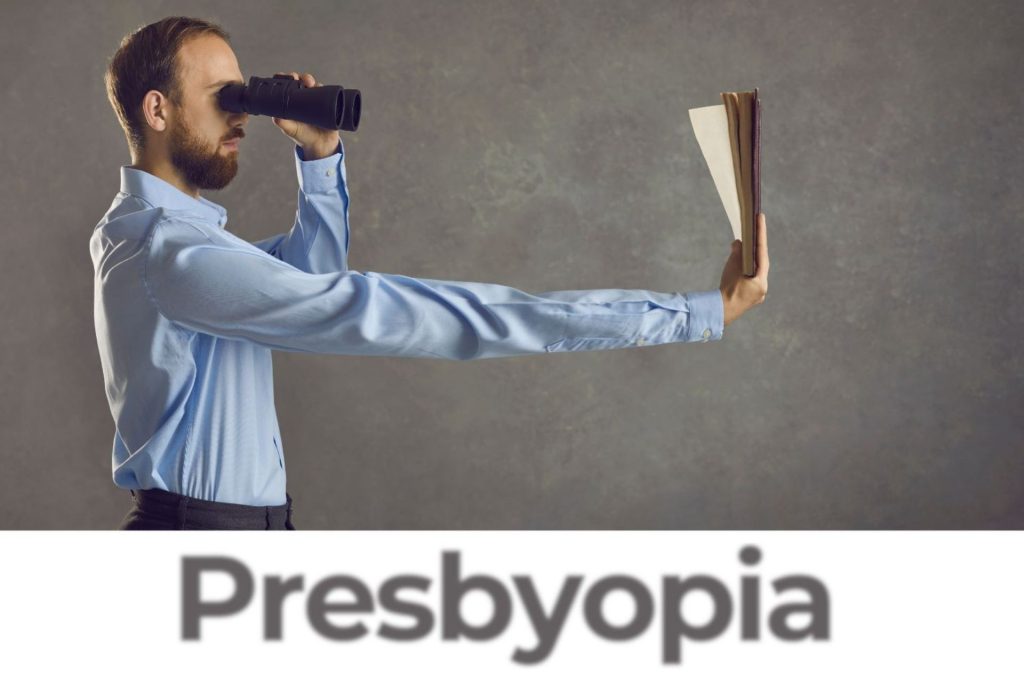 Man looking at book rhrough binoculars