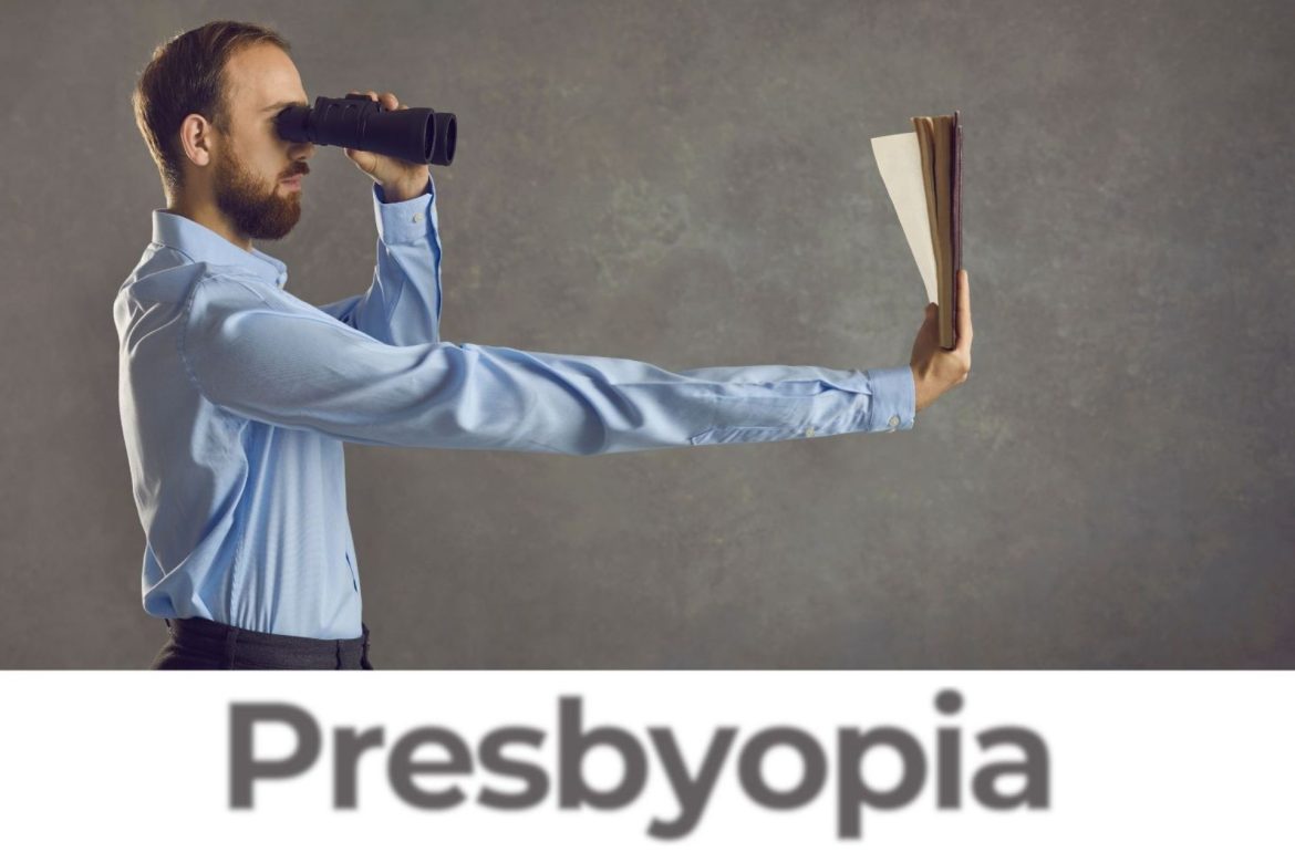 Man looking at book rhrough binoculars