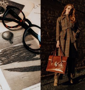 (Left) Woman holding a brown leather satchel up against her long, brown tweed coat (Right) Dark, round, tortoiseshell glasses