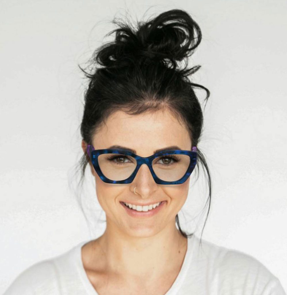 A woman virtually trying on Prada PR 09YV eyeglasses with blue and purple tortoiseshell frames