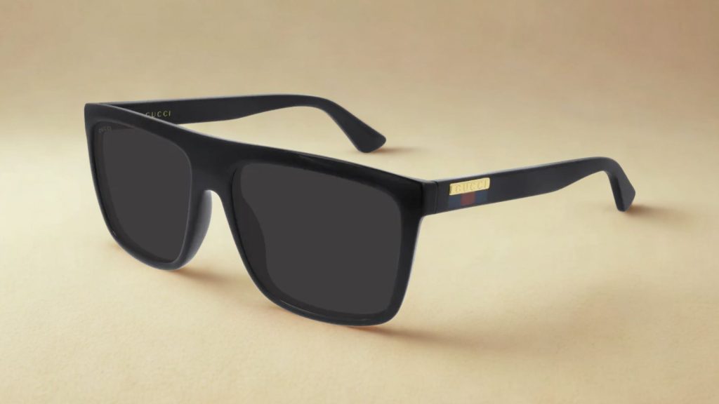 Gucci GG0748S black rectangular sunglasses featuring the Gucci logo on the arm