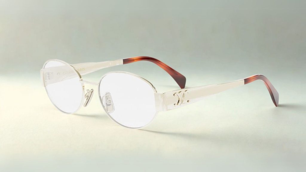 CELINE METAL TRIOMPHE CL50140U oval eyeglasses featuring light gold metal frames with tortoiseshell-patterned temple tips