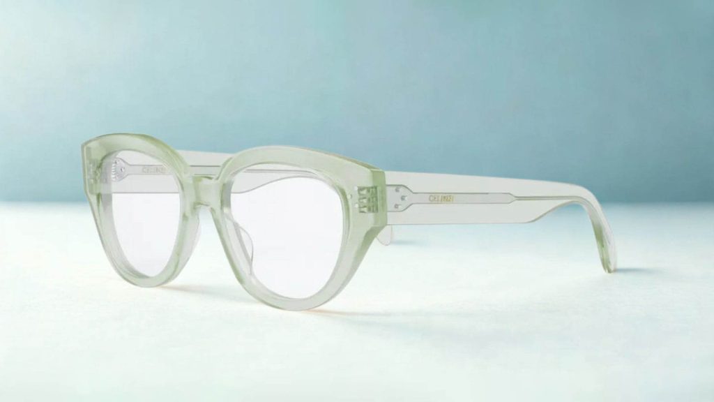 CELINE 3 DOTS CL50132I cat-eye glasses featuring transparent green frames