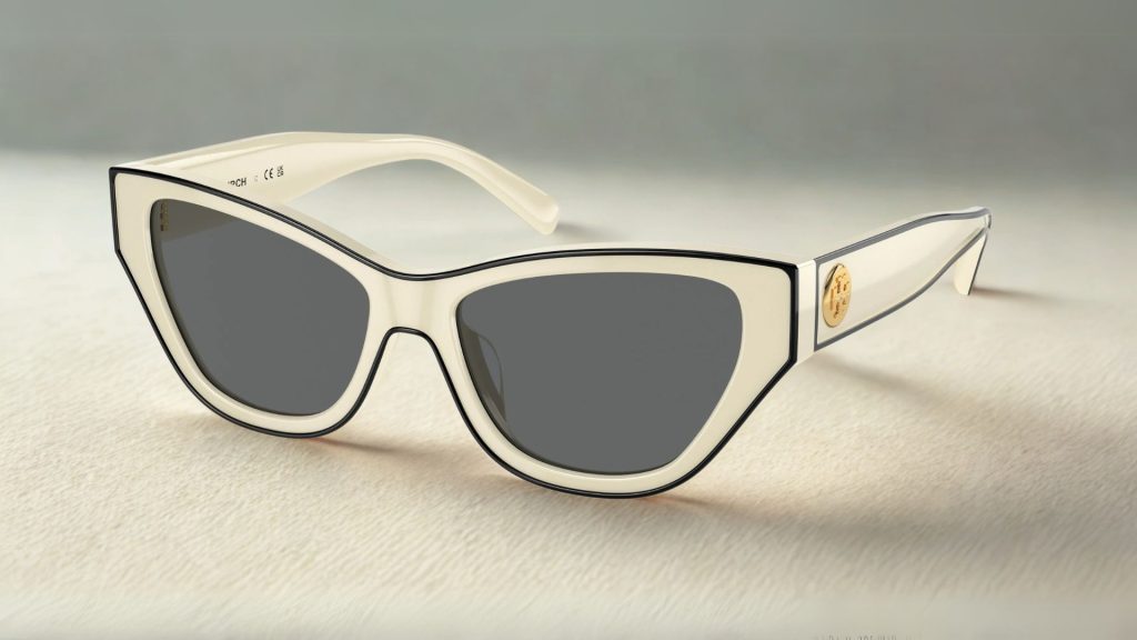 Tory Burch TY7206U sunglasses featuring ivory and black frames and gold logo detailing