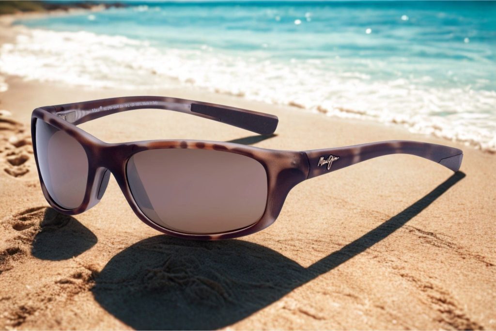 Maui Jim Kipahulu wrap-around sunglasses featuring brown tinted lenses and marlin blue frames