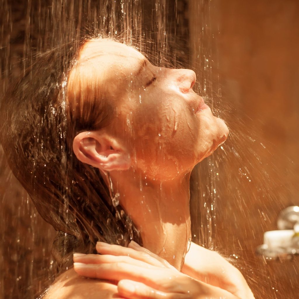 A woman taking a shower