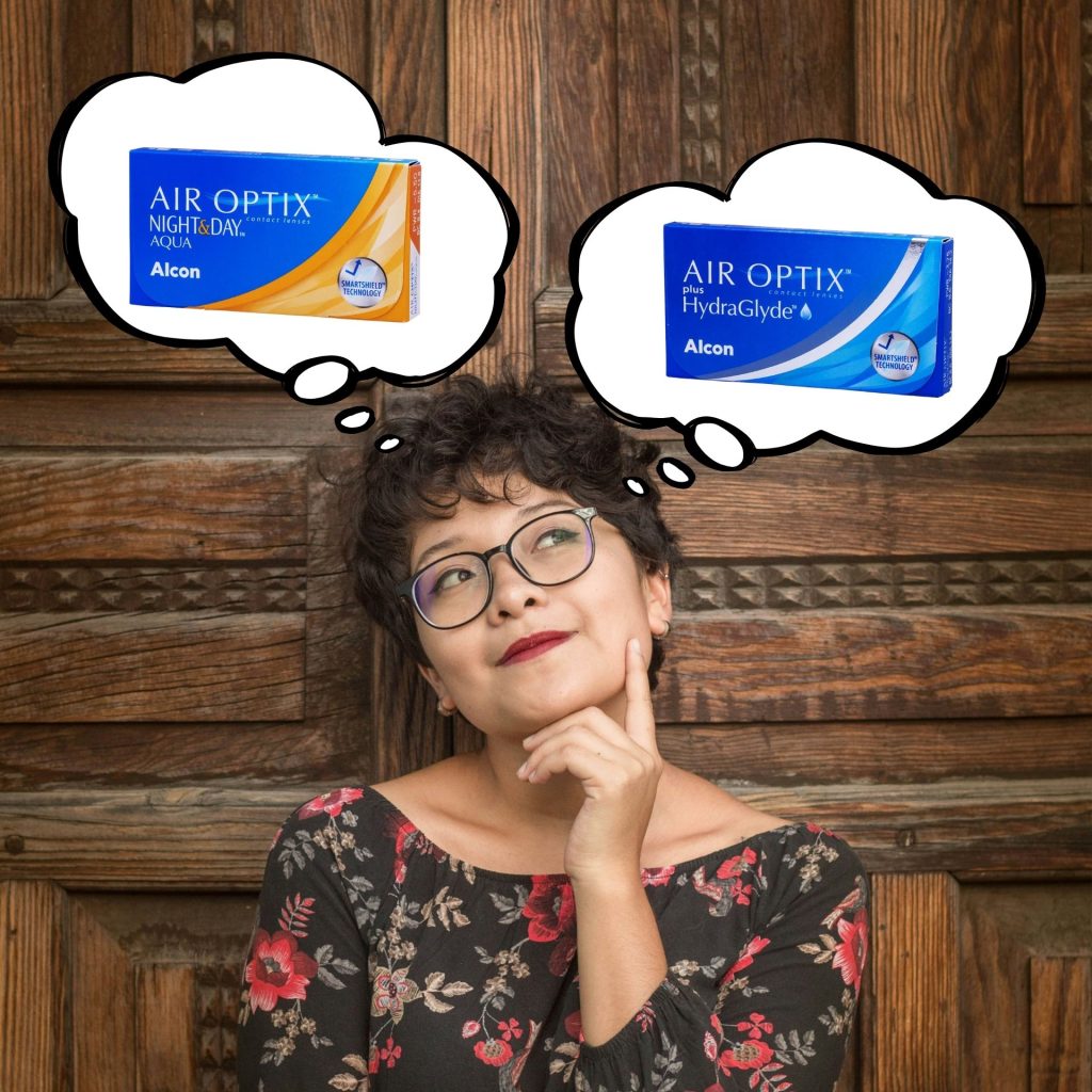 A woman trying to choose between Alcon AIR OPTIX Night & Day AQUA and AIR OPTIX Plus HydraGlyde contact lenses