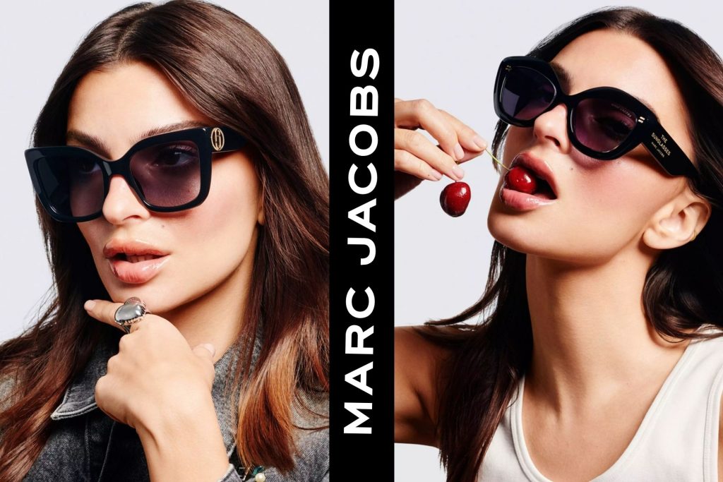 Two brunette women wearing black Marc Jacobs sunglasses with dark-tinted lenses