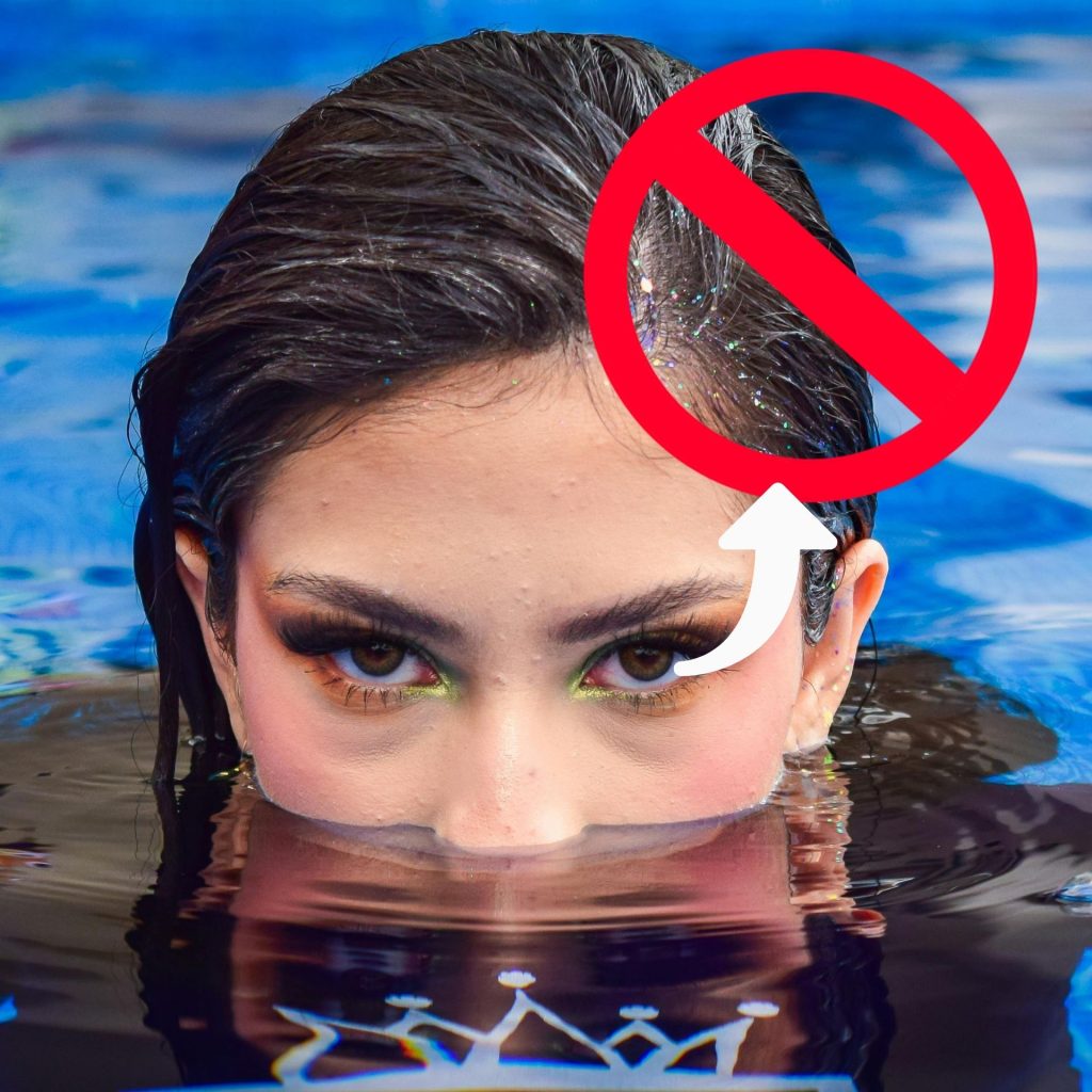 Woman with her head above water in pool