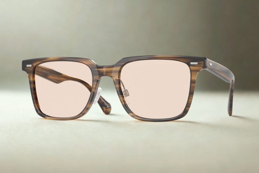 Full-rim Olive Smoke acetate frames with subtle stylings along the hinges and photochromic lenses