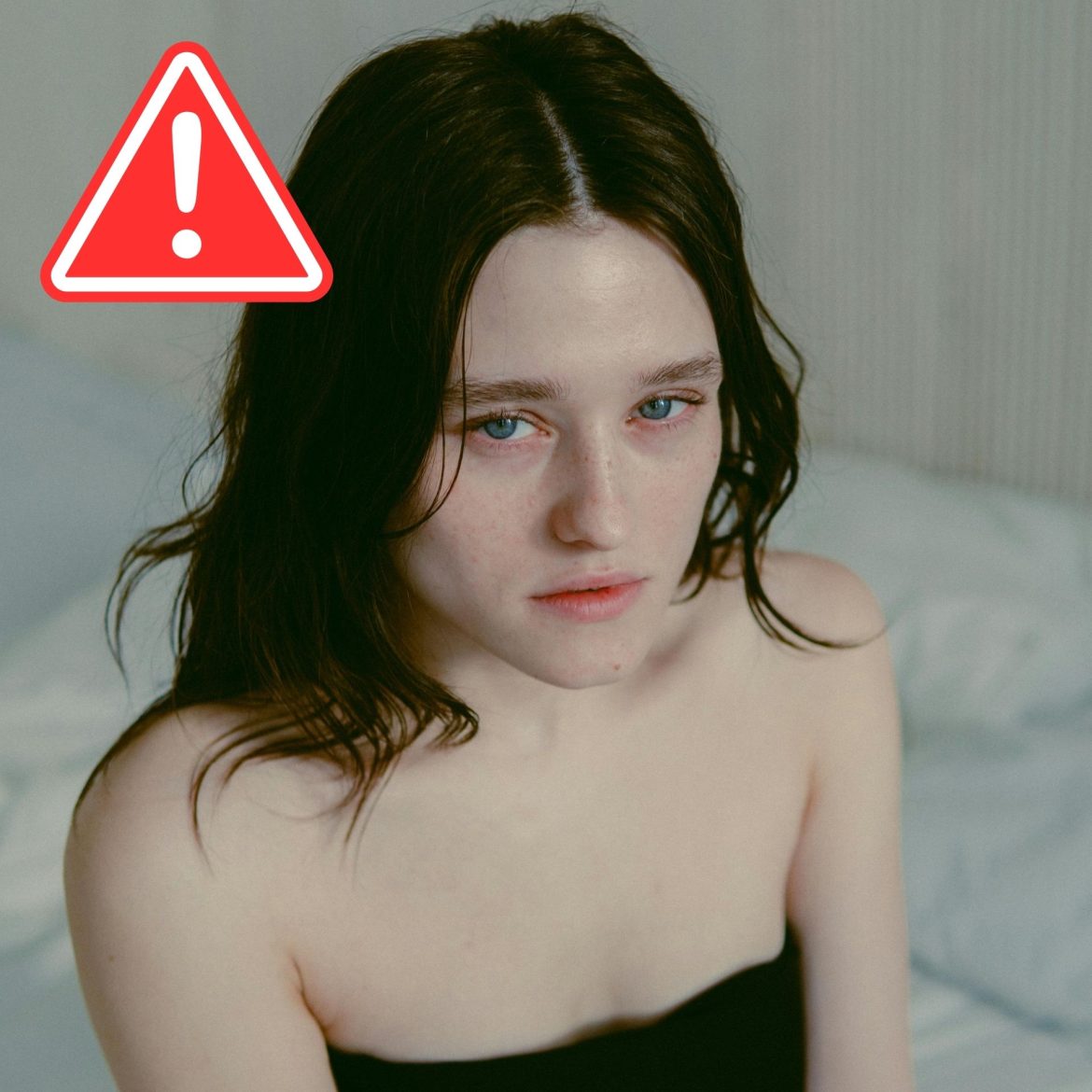 Thin woman with tired-looking eyes