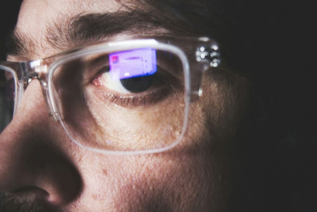 Man wearing glasses featuring transparent frames