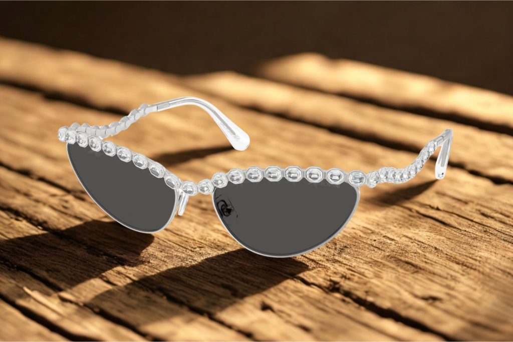 Swarovski SK7030 cat-eye sunglasses featuring silver jewel-encrusted frames