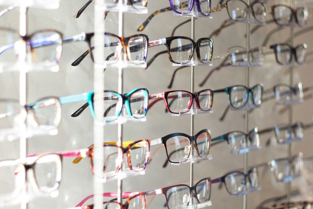 Glasses on clear shelves