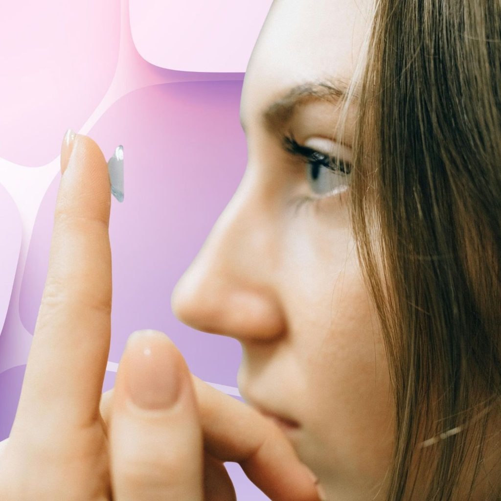 Woman putting in a contact lens