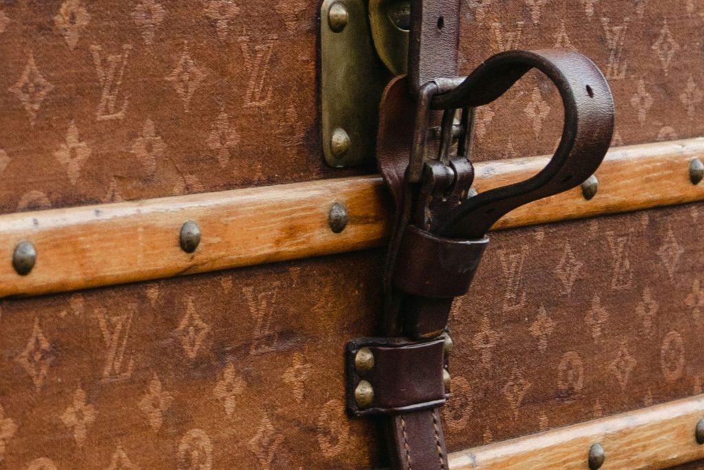 Vintage Louis Vuitton leather trunk with logo detailing