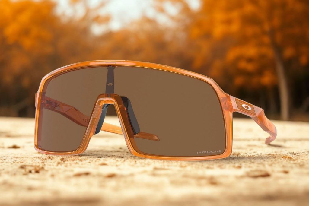 Oakley SUTRO OO9406 sunglasses featuring orange frames