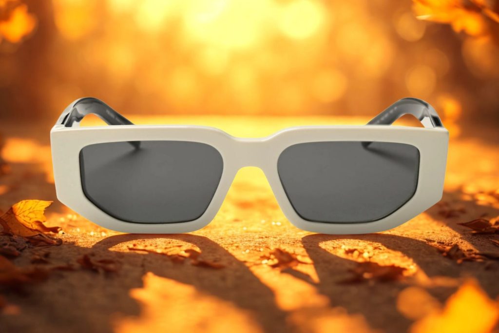 Prada PR 09ZS sunglasses featuring talc and gray frames