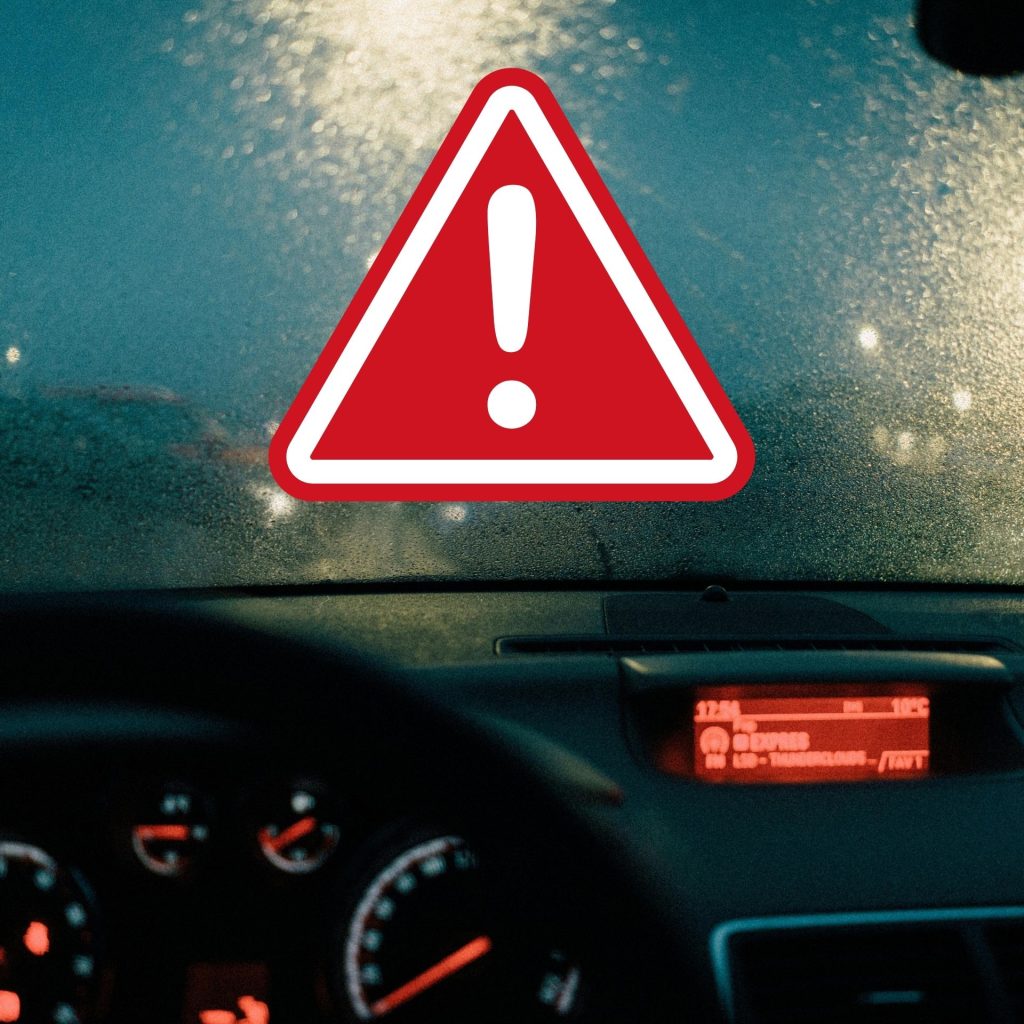 Night driving through rainy weather