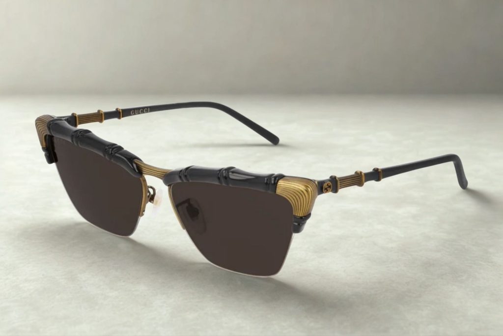 Gucci GG0660S cat-eye sunglasses featuring bamboo effect frames