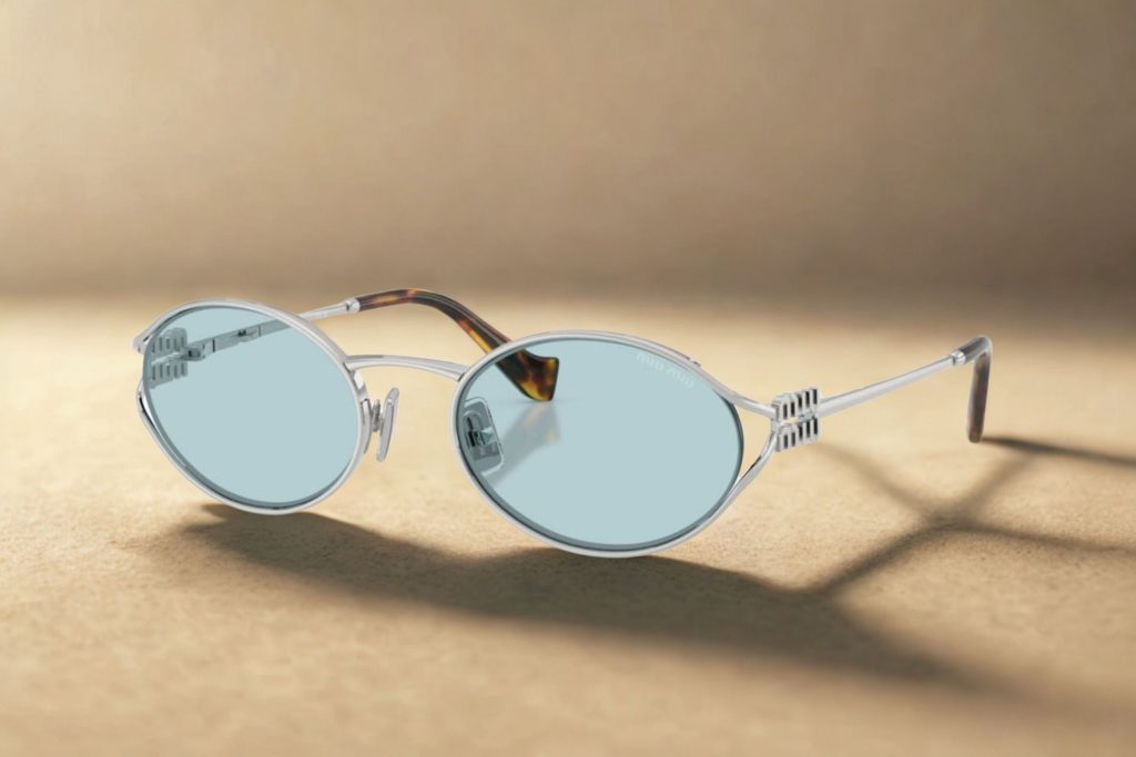 Miu Miu MU 52YS oval sunglasses featuring blue lenses
