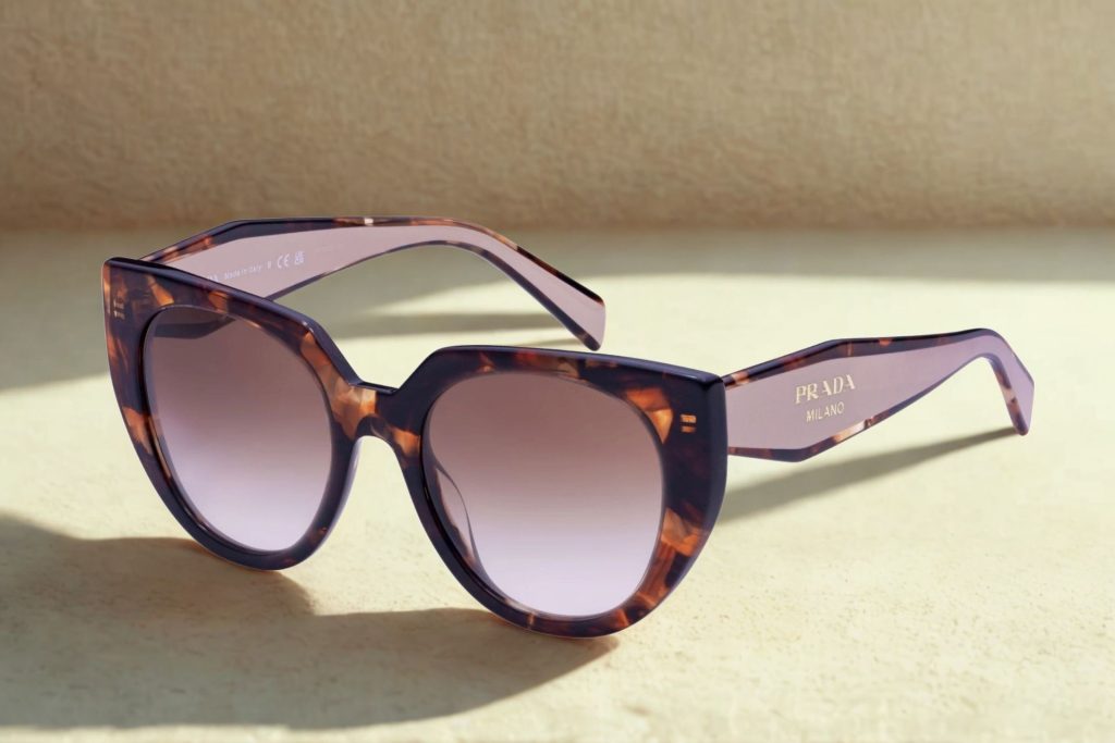 Prada PR 14WS sunglasses featuring pink lenses