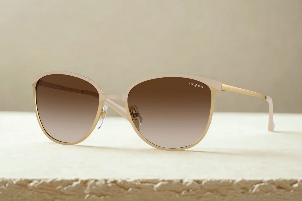 Vogue VO4002S sunglasses featuring beige frames and gradient lenses