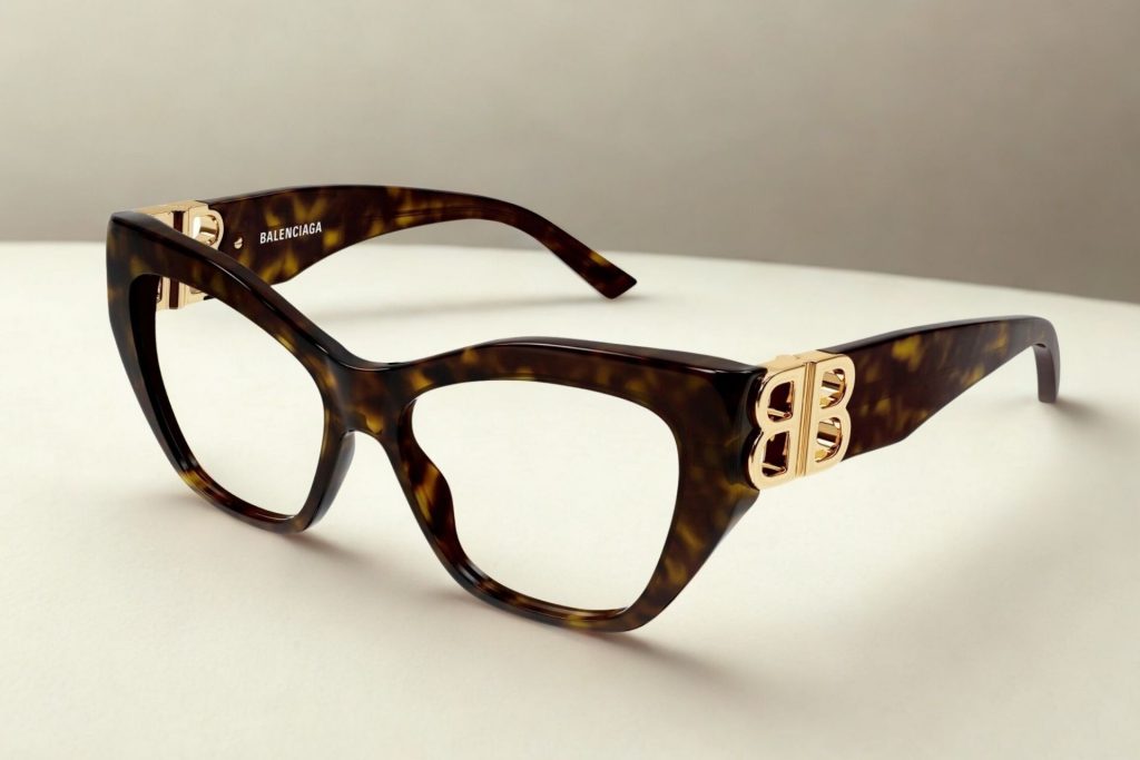 Balenciaga BB0312O glasses featuring Havana frames and a gold logo