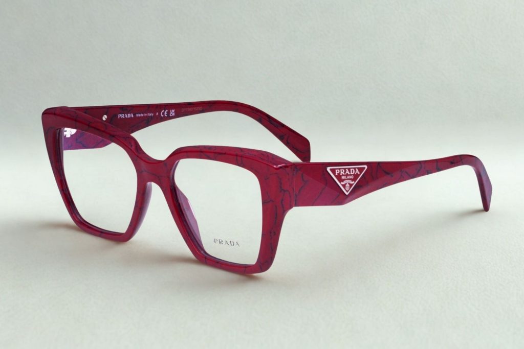 Prada PR 09ZV eyeglasses featuring thick Etruscan marble frames