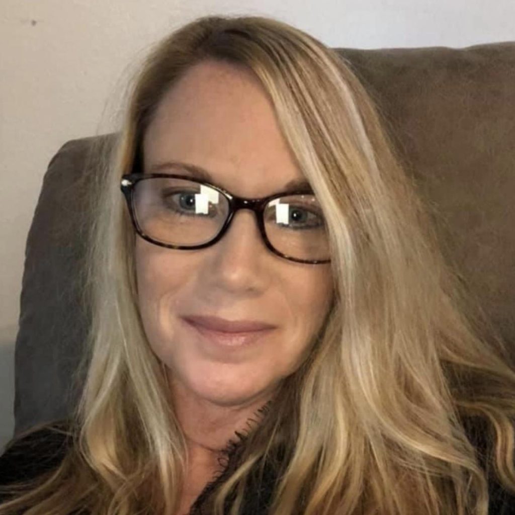 Customer Cori B. wearing Coach HC6065 glasses