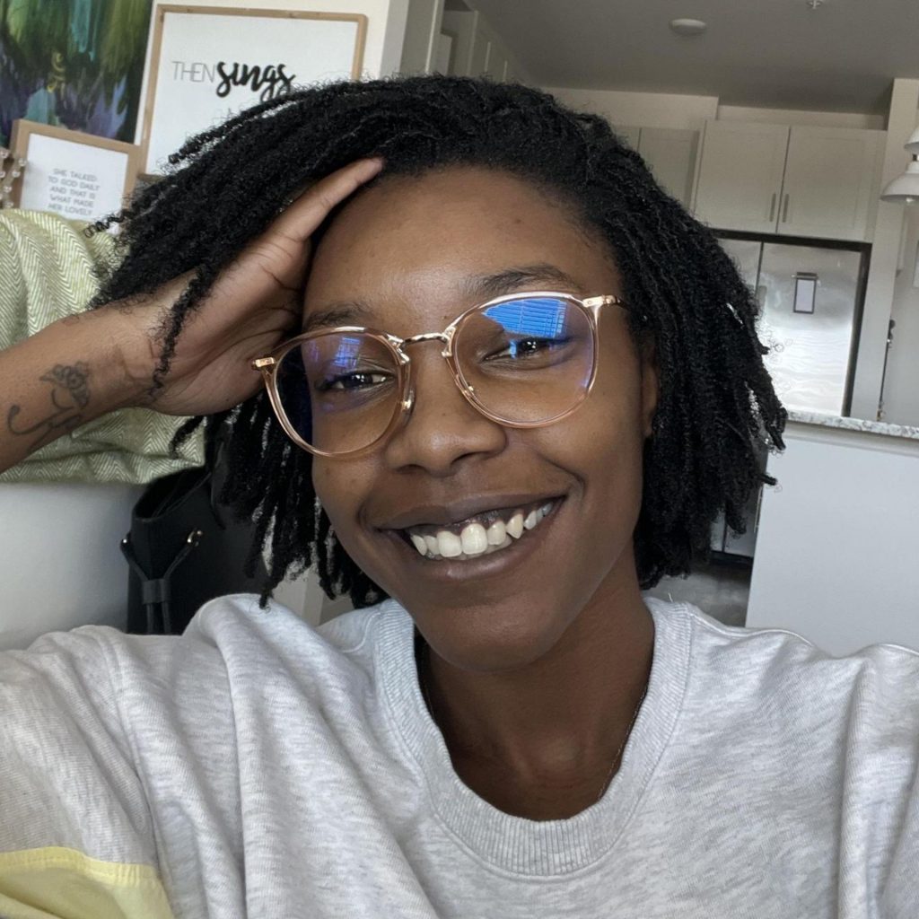 Customer Kaylee J. wearing Ray-Ban RX7140 circle light brown eyeglasses