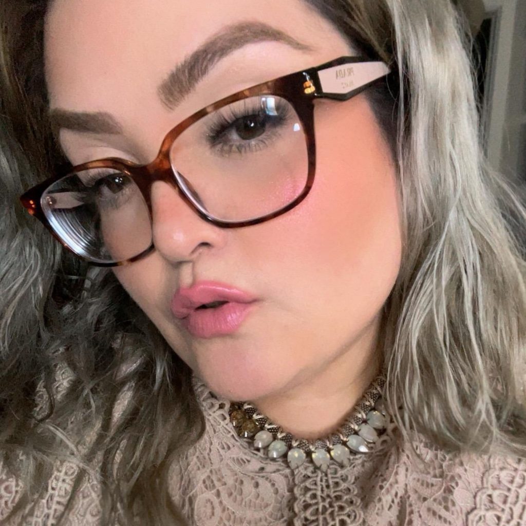 Customer Griselda B. wearing Prada PR 17ZV eyeglasses featuring Havana frames