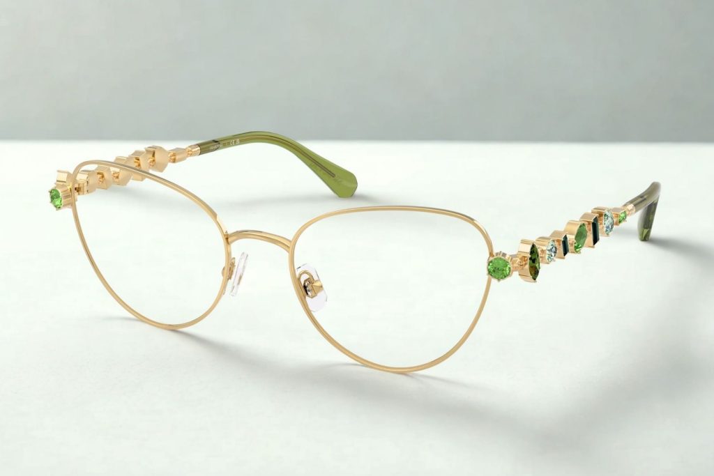 Swarovski SK1024 glasses featuring gold frames and green gems