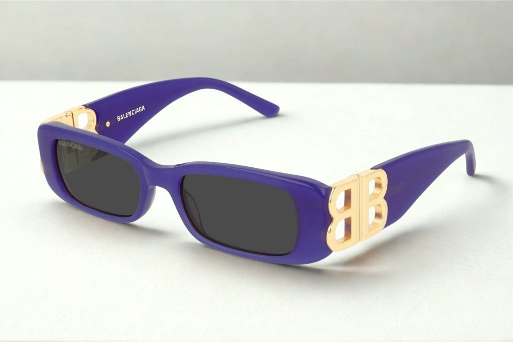 Purple Balenciaga BB0096S sunglasses with gold logos on arms