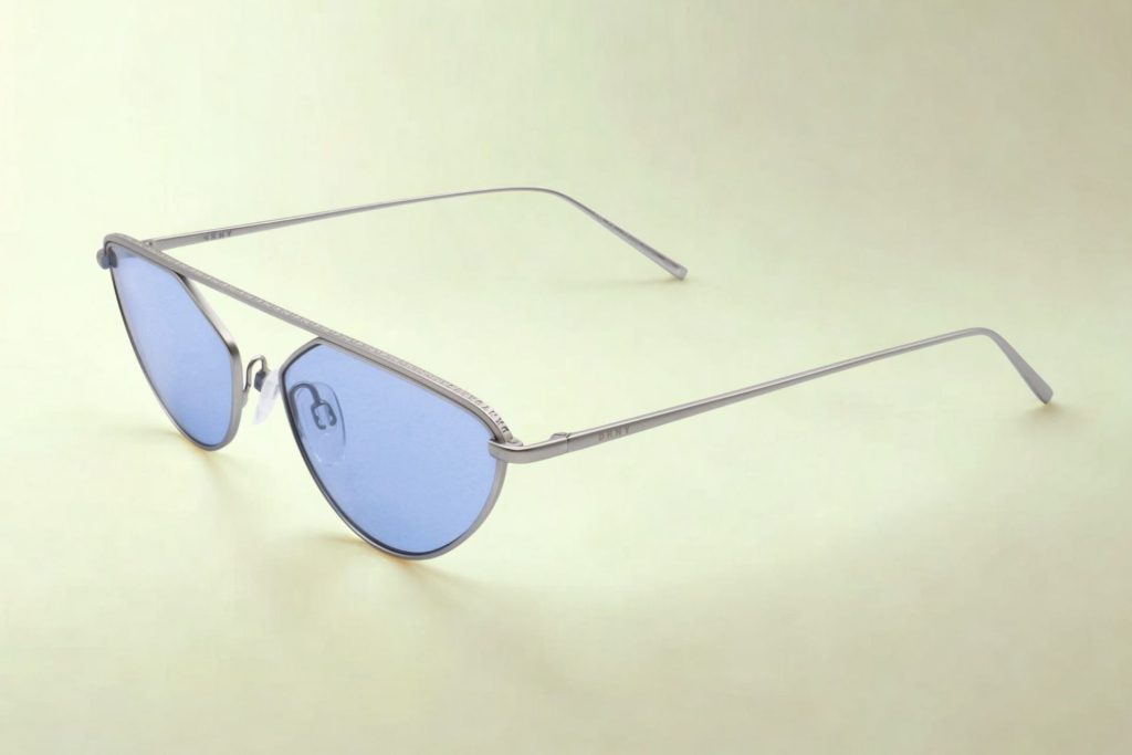 DK109S sunglasses featuring silver frames and blue-tinted lenses