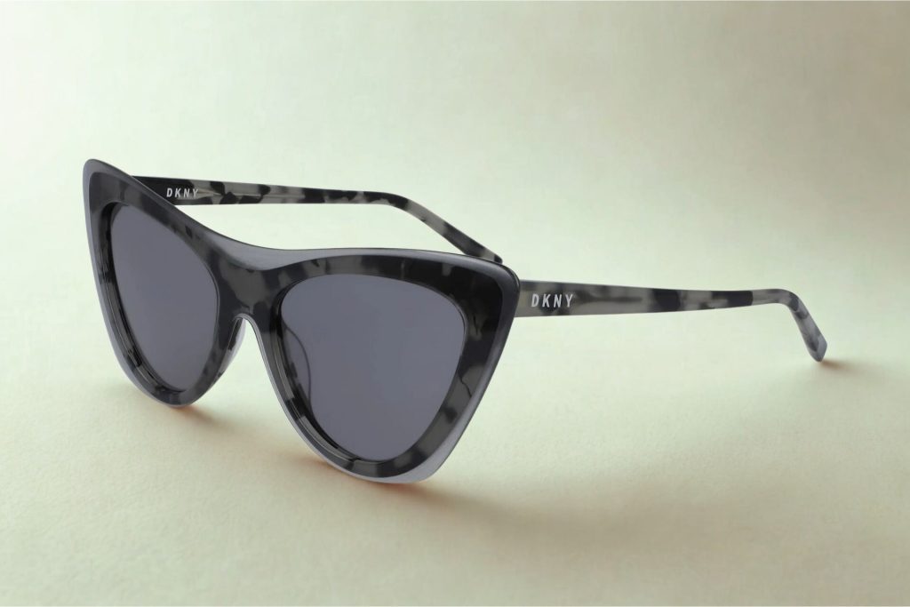 DKNY DK516S cat-eye sunglasses featuring gray tortoise frames