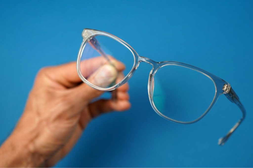 Man holding clear glasses