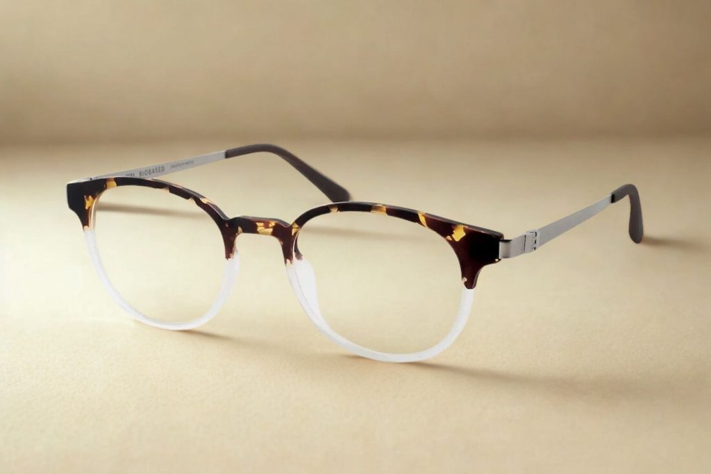 Full rim plastic frames with a tortoiseshell upper frame and a clear lower frame