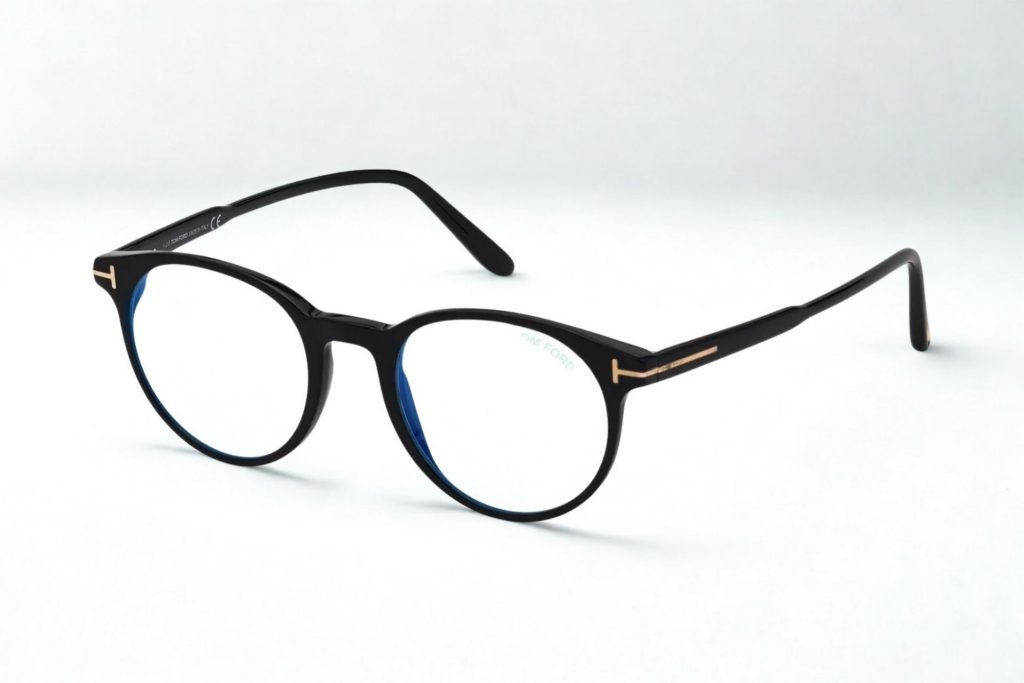 Black round plastic frames with subtle metallic stylings along the hinges