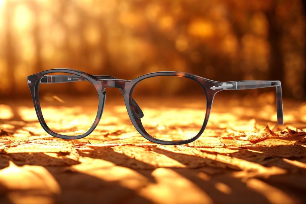 Round plastic tortoiseshell glasses with metal styling along the hinges