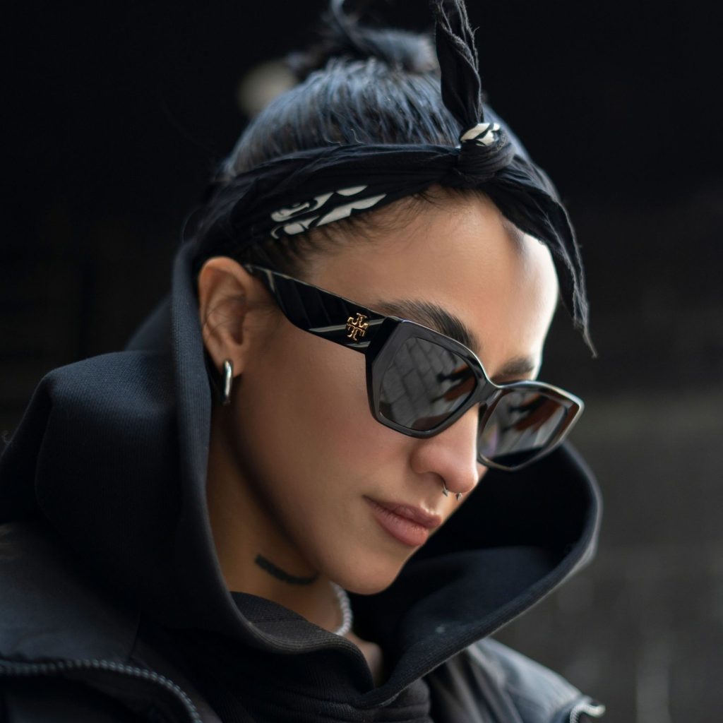 Woman in Tory Burch Sunglasses