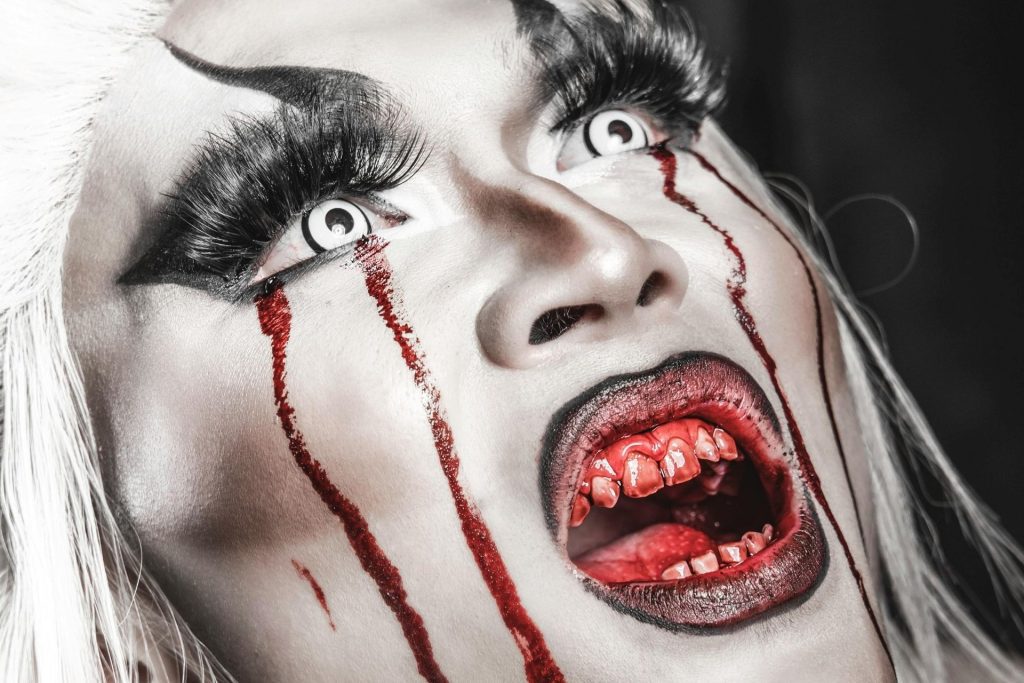 Female ghoul with a bloody mouth