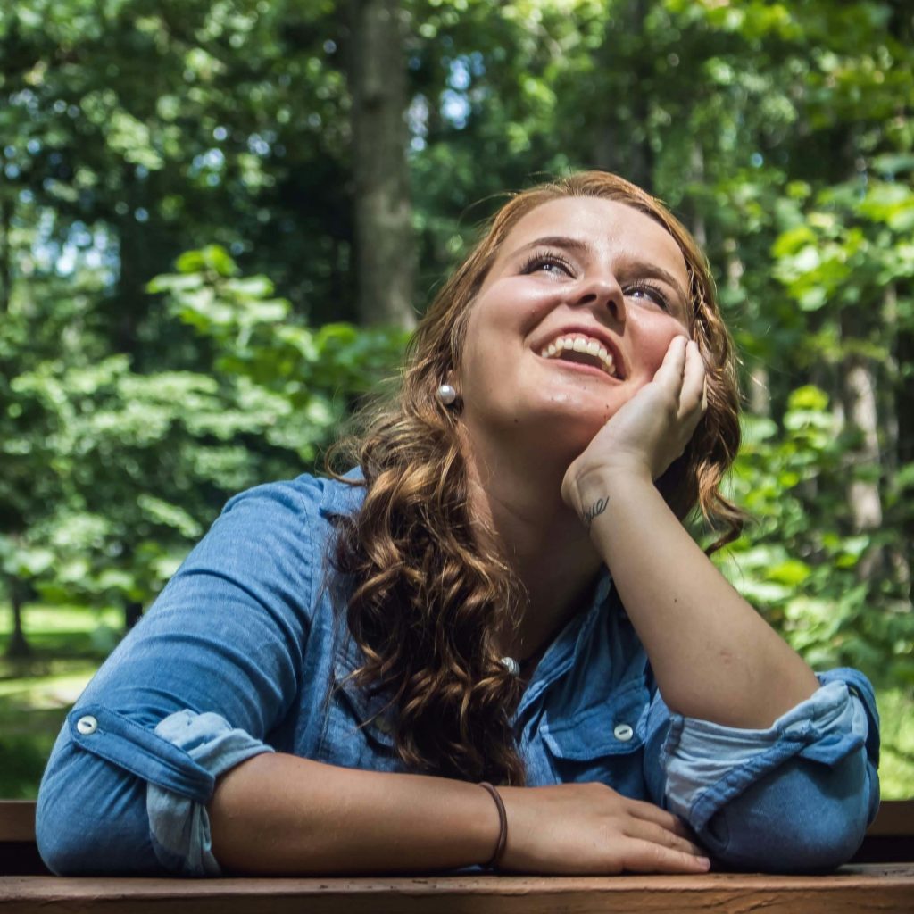 Woman looking up during daytime