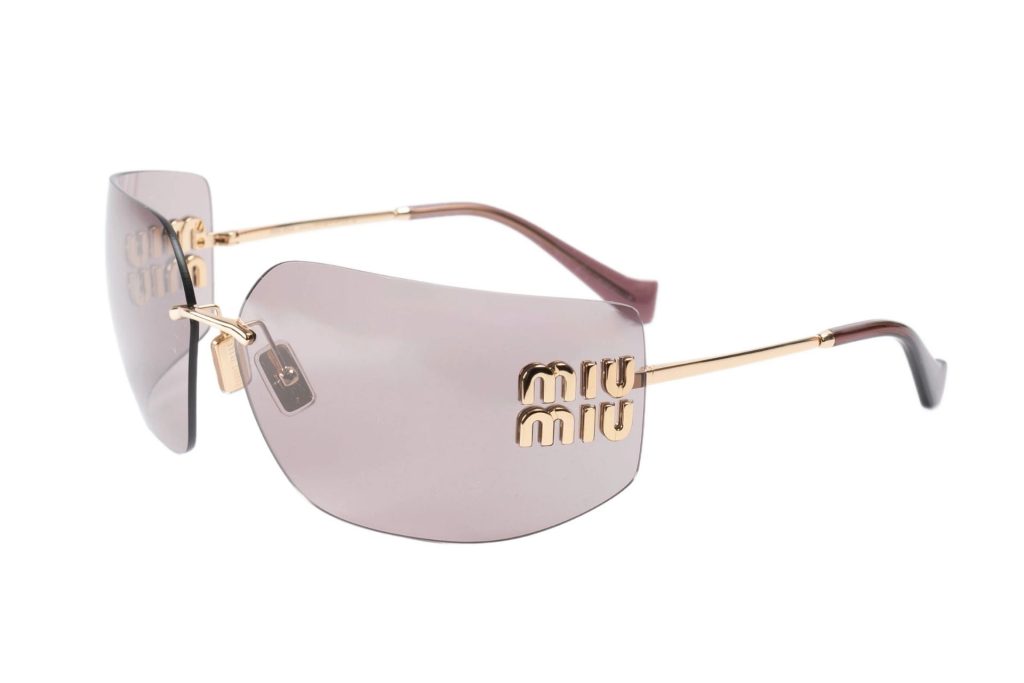 Miu Miu MU 54YS sunglasses featuring pink lenses