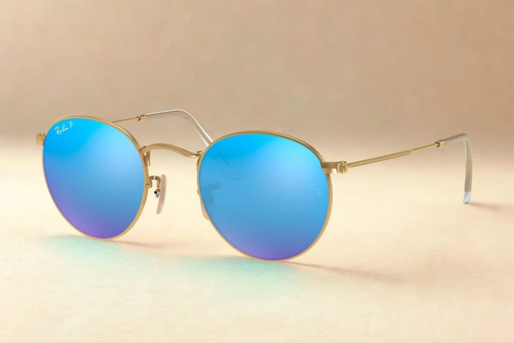 Ray-Ban RB3447 ROUND METAL with gold rims and blue lenses