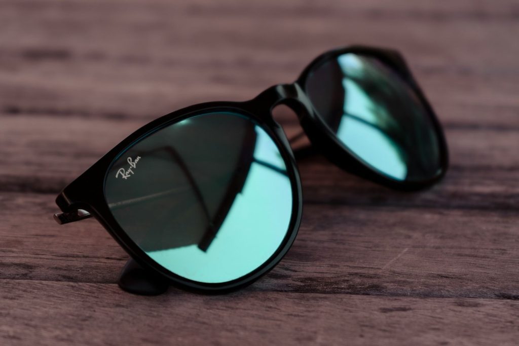 Ray-Bans on a wooden table