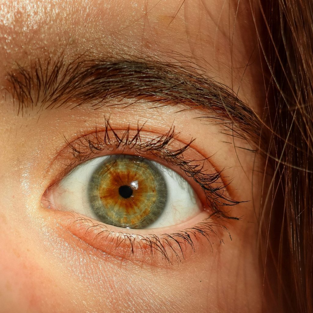 Close-up on a woman’s hazel eye