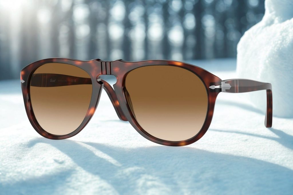 Persol PO0649 sunglasses featuring brown frames and lenses