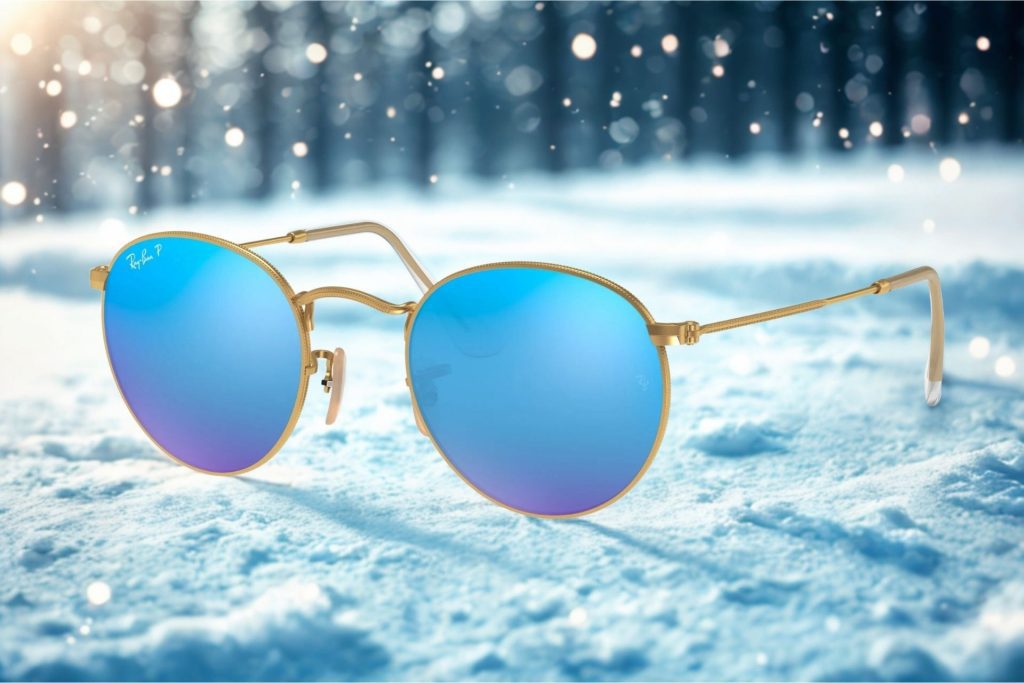 Ray-Ban RB3447 ROUND METAL sunglasses featuring blue lenses